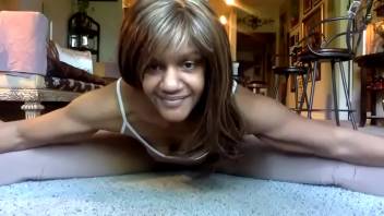 Ginger MoistHer Sexy Stretches in Tan bodysuit.  Legs wide open.  Enjoy the stretch.  Subscribe!  Lay Down Comedy!